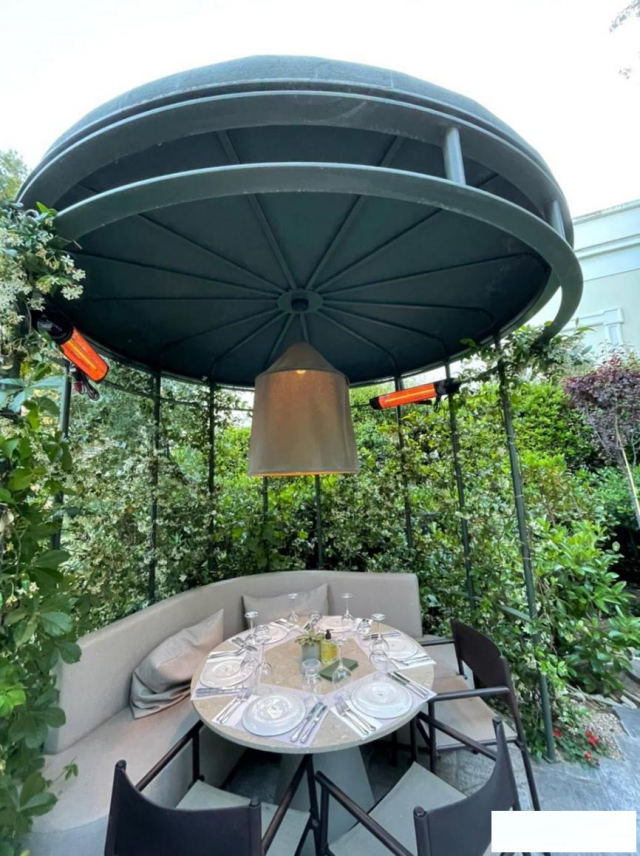 希腊户外餐厅的冬日奇迹：伟而特红外供暖带来的即刻温暖